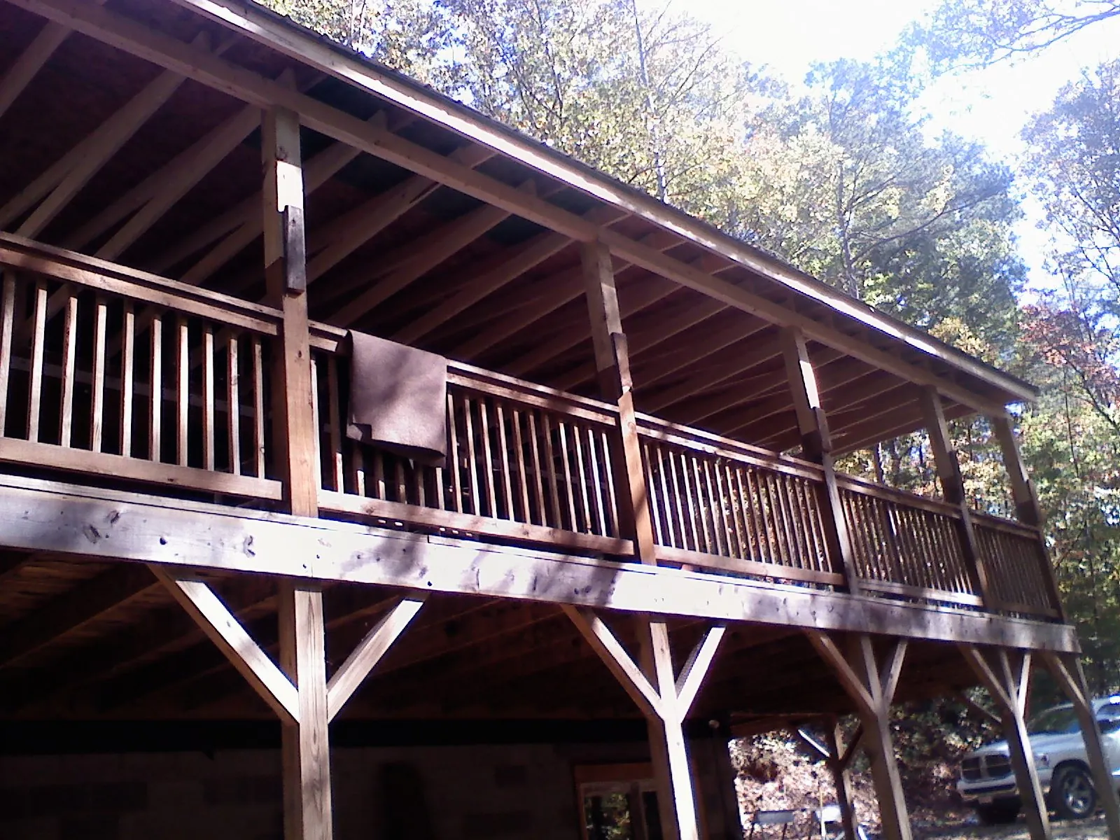 Timber framing under a new elevated porch and deck — Roof Leak Repair in Tribune by Roofing Brothers